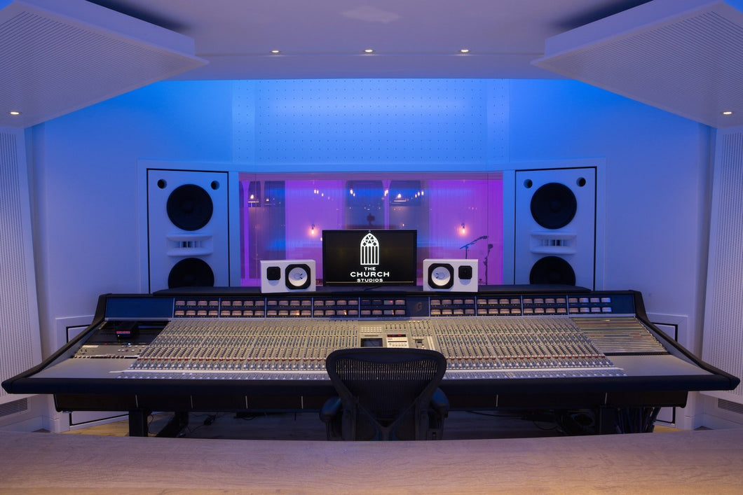 White Augspurger Duo-15 Speaker System front view in music studio.